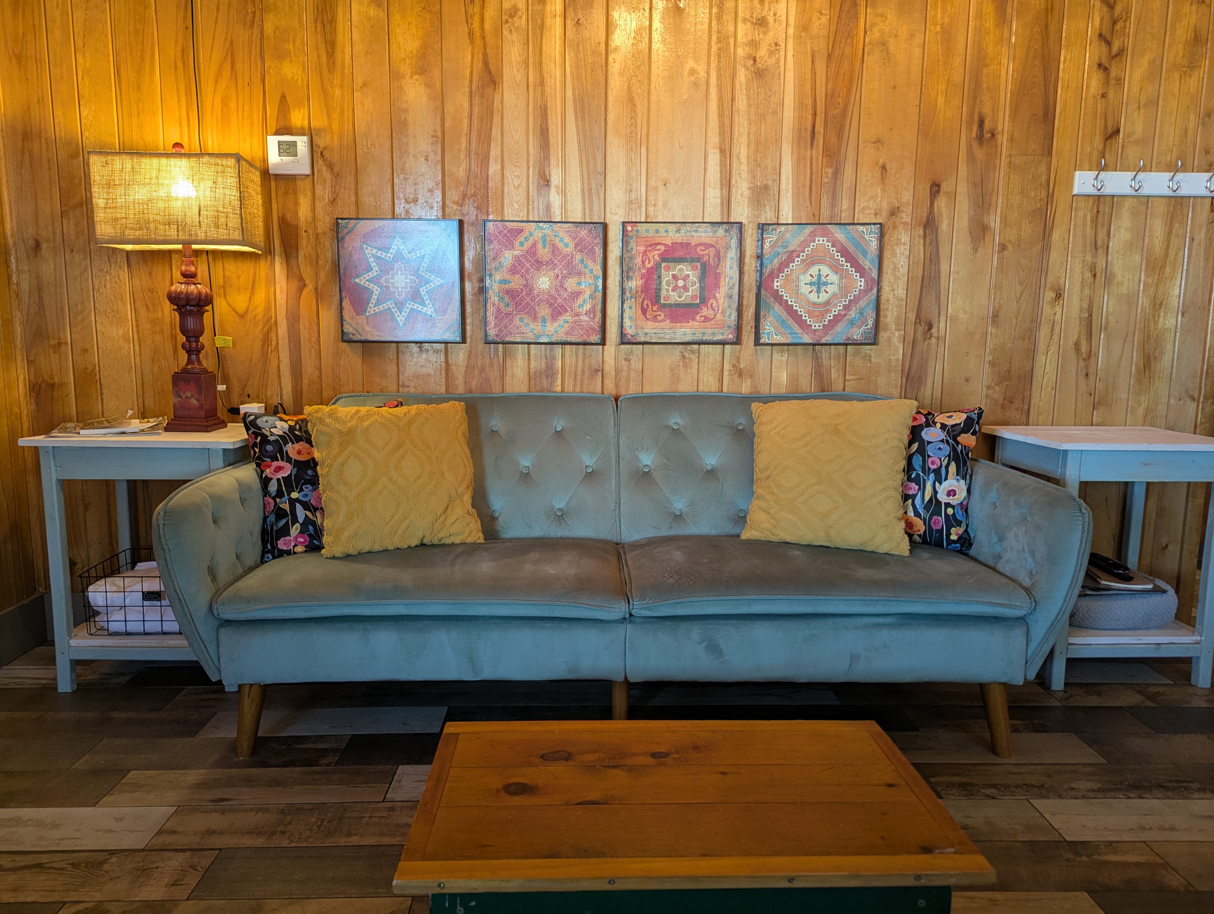 couch with art work above