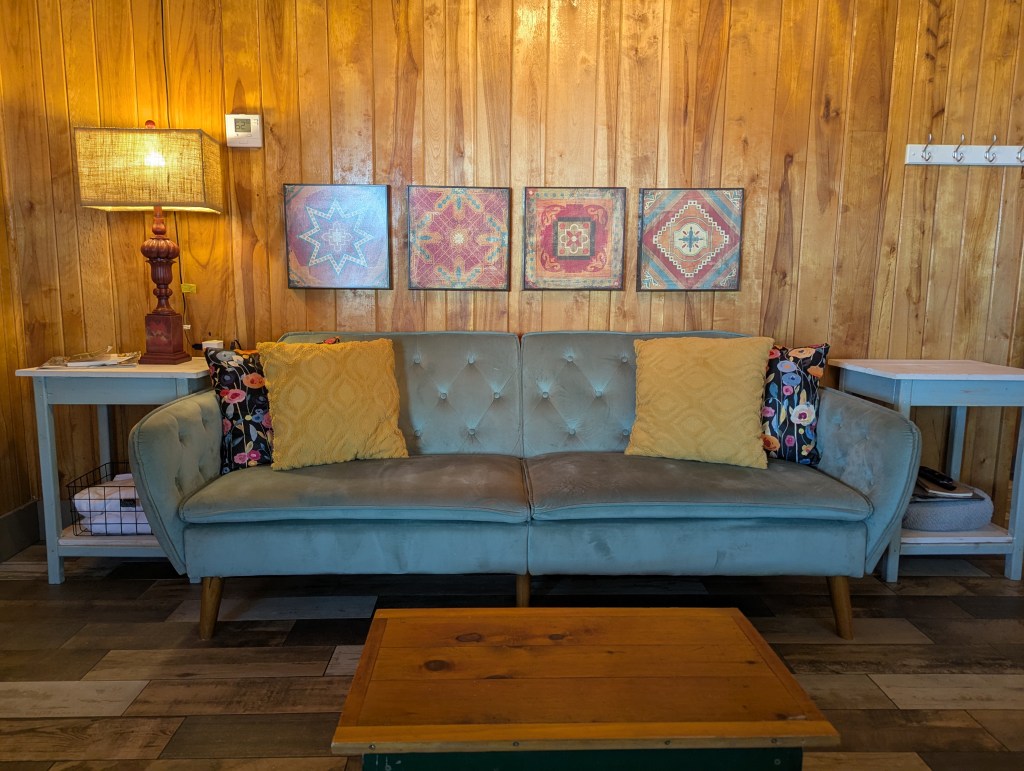 couch with art work above