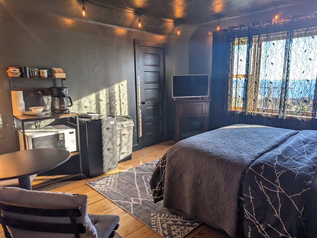 bedroom with window looking at lake